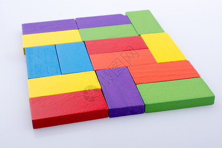 不同颜色的多米诺区块积木商业团体长方形白色闲暇活动玩具骨牌背景图片