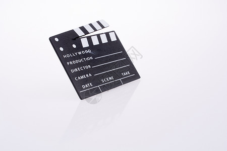 胶片拍摄器娱乐卷轴白色木板相机电视运动工作室石板场景背景图片