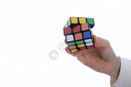 鲁比克的立方体在手智力教育方块红色形状玩具拼图魔方学习游戏背景图片