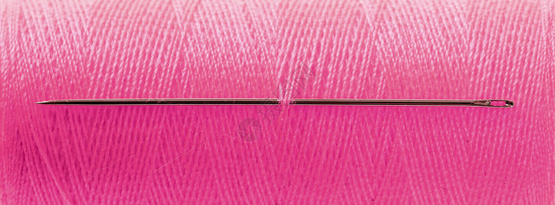 粉红威胁用针头工艺水平粉色衣服棉布创造力爱好家庭背景图片