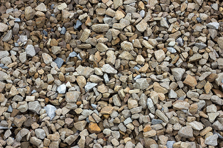彩色碎石 大块碎石的纹理材料墙纸矿物卵石人行道建造花岗岩化石花园瓦砾背景