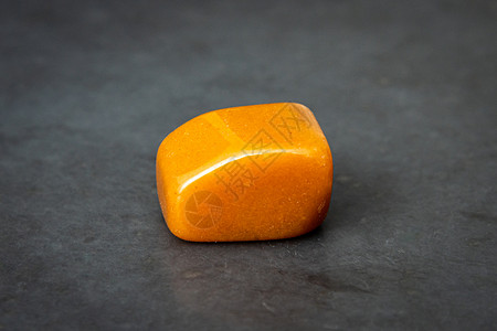 钙尔奇中国玉玉宝石奢华 黄橙色和棕色音调石头市场岩石棕褐色黄褐色物质橙子矿物珠宝积物背景