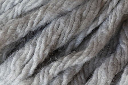 围巾 宏观的毛绒线或螺丝 软灰色我高清图片