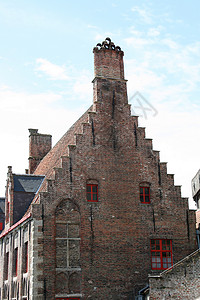 美丽的老房子 带阶梯式山墙 由红砖砌成 Sch�背景图片