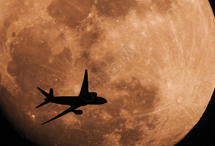 飞行月亮飞过月球的休光飞机月亮旅行航空公司航空喷气旅游环境天文学地平线飞行背景