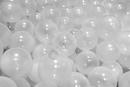 许多白色球或透明的泡沫球背景 Name group气球圆圈塑料玩具水池圆形操场背景图片