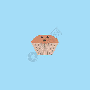 棕色松饼或蛋糕的肖像 蓝色背景蔬菜背景图片