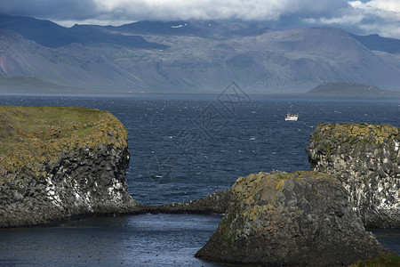 冰岛大西洋海山和海滨 冰岛陆地角海洋天空场景戏剧性国家日落岩石海景旅行背景图片