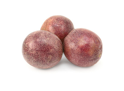 三个充满激情的果实 带斑点紫色皮肤背景图片