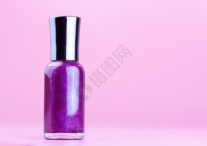 紫色指甲油瓶背景图片