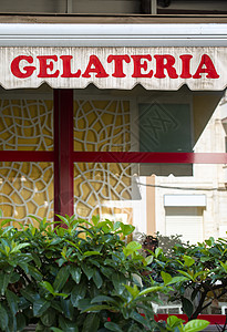 意大利冰淇淋 冰激凌 冰盖的面孔建筑旅游餐厅冰箱甜点遮阳帘奶油咖啡街道小吃背景图片