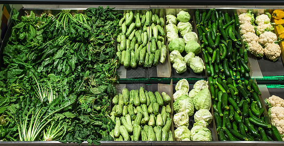 蔬菜架子超市货架上的蔬菜青菜菜花篮子生产食物菊苣杂货商顾客价格产品背景