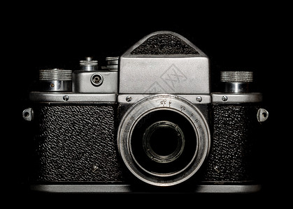 黑色背景切换黑背景的老旧相机镜头空白老相机技术镜片金属灰色背景图片
