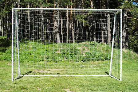 足球素材网带网的足球门黑色绿色竞赛沥青娱乐场地活动乐趣蓝色森林背景