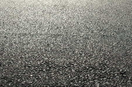 道路平面和沥青矿物地球运输地质学石头黑色灰色维修地面制造业背景图片