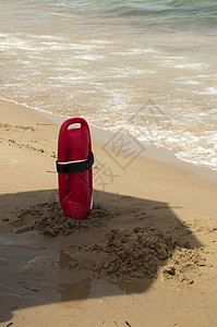 救人救人的救生员的红浮标储蓄者海岸安全海洋橙子风险塑料工具警卫救援背景图片