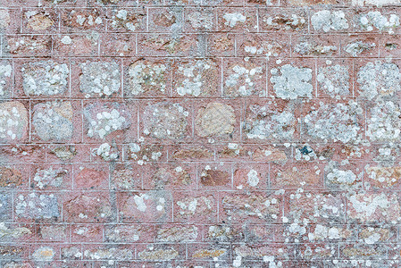 旧墙壁纹理花岗岩岩石建造石工建筑石头墙纸粒状水泥砂浆背景图片