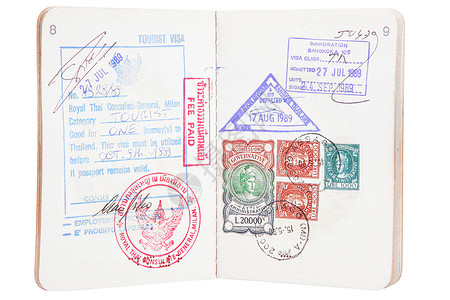 护照邮票印有邮票的开放护照背景
