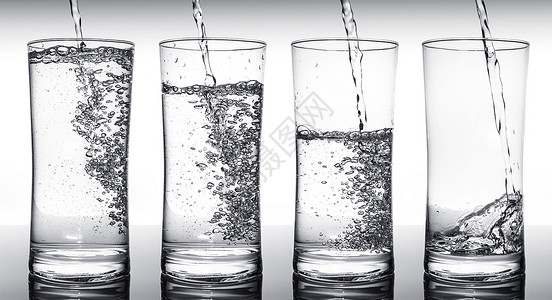 按顺序给玻璃杯注水液体眼镜气泡飞溅碳酸团体海浪冰镇白色饮料背景图片