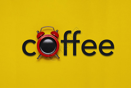咖啡概念 配有闹钟和文字背景图片