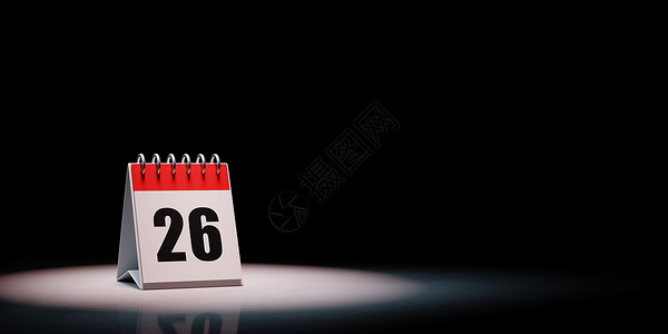 黑色背景上突出显示的日历第 2 天点燃插图台历白色聚光灯桌子红色数字背景图片