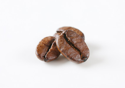 烤咖啡豆烘烤贸易棕色背景图片
