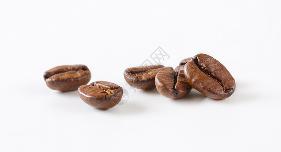 烤咖啡豆棕色烘烤贸易背景图片