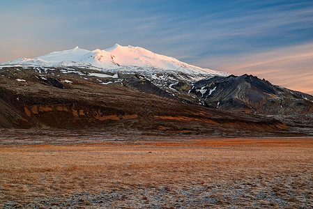 斯奈山日落 冰岛水平旅行火山石头地标天空半岛顶峰风景冰川背景