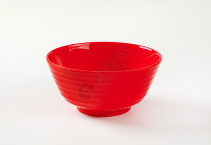 红塑料碗圆形盘子背景图片