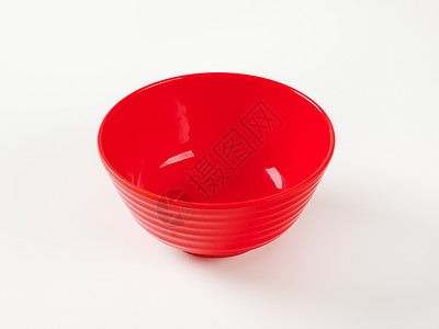 红塑料碗盘子圆形背景图片
