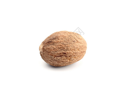 孟买弯Nutmeg在白色背景中被孤立 特写地面季节食物味道团体宏观香料草本植物香气下巴背景