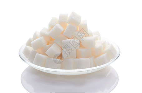 糖块团体食物盘子白色玻璃颗粒状背景图片