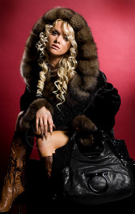 coatA Fur Coat的年轻女性魅力毛皮发型吸引力季节性青春期上诉青年外套工作室背景