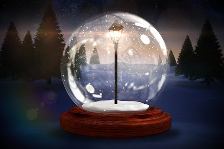 在雪球中的灯泡张贴在雪球上背景图片