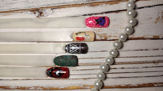 美甲设计轮 一套用于修指甲的假指甲调色板染料女性手指收藏艺术魅力顾客沙龙样本背景