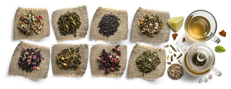 茶叶林白色背景上的大型茶叶组合 从顶部的视图植物饮料收藏芳香产品辣木茶壶香气木槿花瓣背景