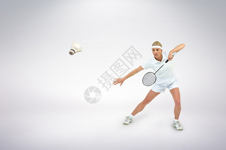 羽毛球选手羽毛球运动员打羽毛球的合成图像行动身体成就选手精神训练羽毛游戏运动女性背景