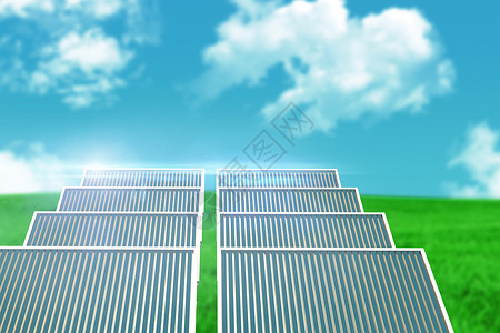 太阳能电池板图太阳能电池板与地貌景观对比的复合图像图背景