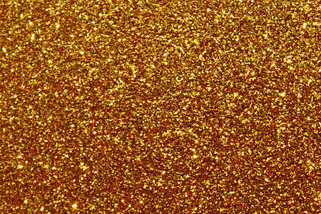 背景与金色闪闪发光的 pape奢华火花闪光金子背景图片