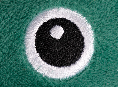大型大眼 高管器械童年棉布玩具白色眼睛绿色背景图片