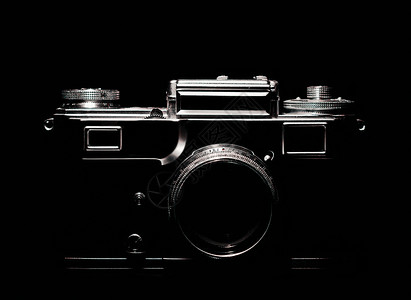 古老的照相机在黑暗中抛光技术配置墙纸电路摄影师镜片剪影轮廓镜头相机背景图片
