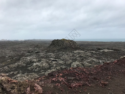 地震学形成小火山的红和灰红色冰岛火山岩各大洲之间的桥梁;在背景