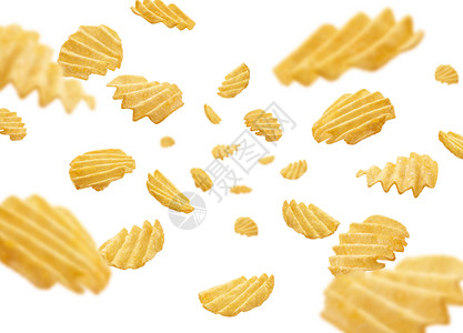 白色背景的电流马铃薯薯片悬浮黄色盐渍芯片航班瓦楞垃圾圆形土豆薯条广告背景图片