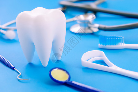 牙科牙医卫生背景牙线牙刷医生设备蓝色磨牙器材诊所牙齿乐器背景图片