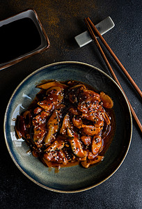 酸甜苦辣传统的中华甜酸猪肉食物环境蔬菜油炸陶瓷制品木板大豆刀具猪肉背景