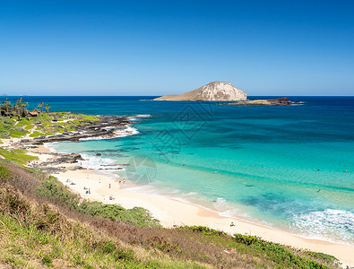 东奥胡 马卡普乌海滩上带兔子岛的东Oahu海岸线蓝色支撑岩石旅行缝合海洋海滩海岸海景热带背景图片