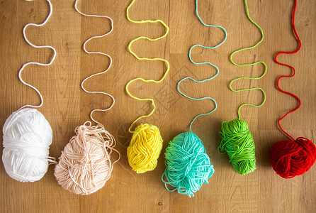 编织线白色针线活衣服手工针织粉色羊毛工艺项目织物背景图片