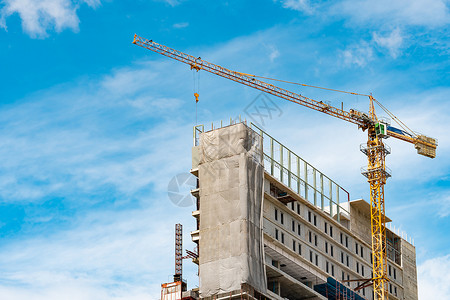 有起重机和建筑的建筑工地 房地产业安全项目住宅框架天空商业摩天大楼植物水泥房子背景