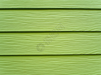 人造木墙的纹理条纹绿色建筑材料木材木板木头房子控制板背景图片