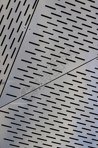 具有线槽口纹理的金属形状 钢三角背景线条缺口艺术三角形艺术品背景图片